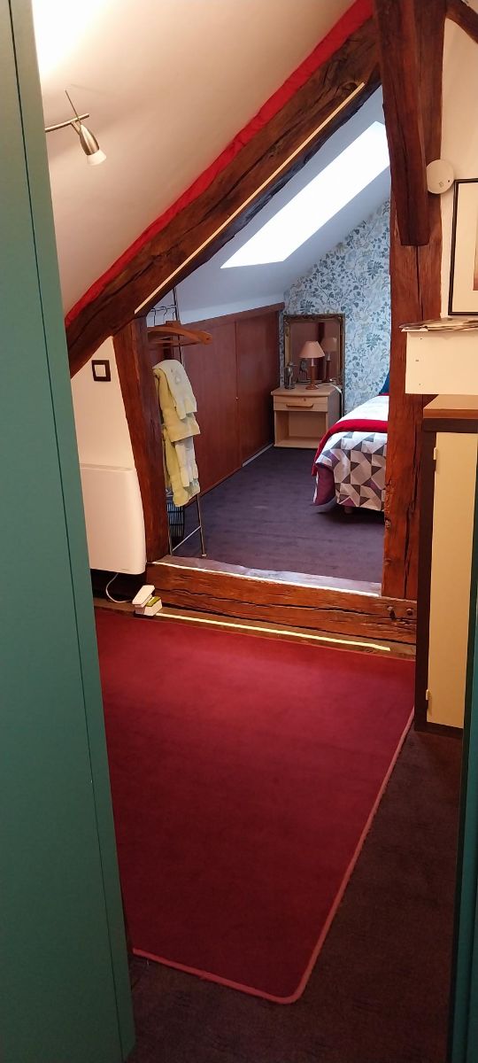 en haut de l'escalier à la Mezzanine en haut de l'escalier à la Mezzanine