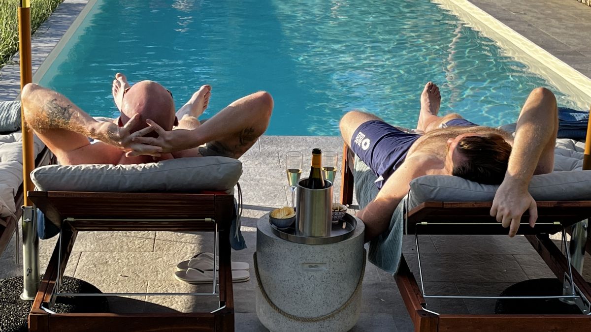 Relax and enjoy a local wine at the pool