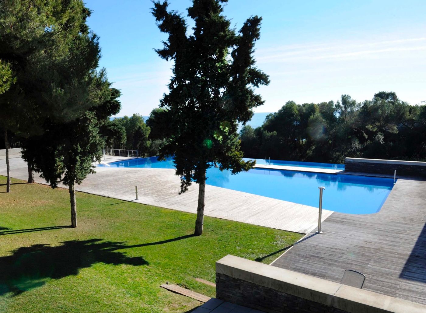 Common pool in the residence front of sea Common pool in the residence front of sea