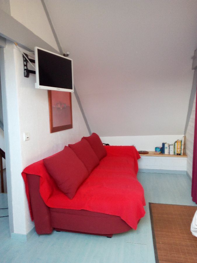 Le coin salon dans la chambre