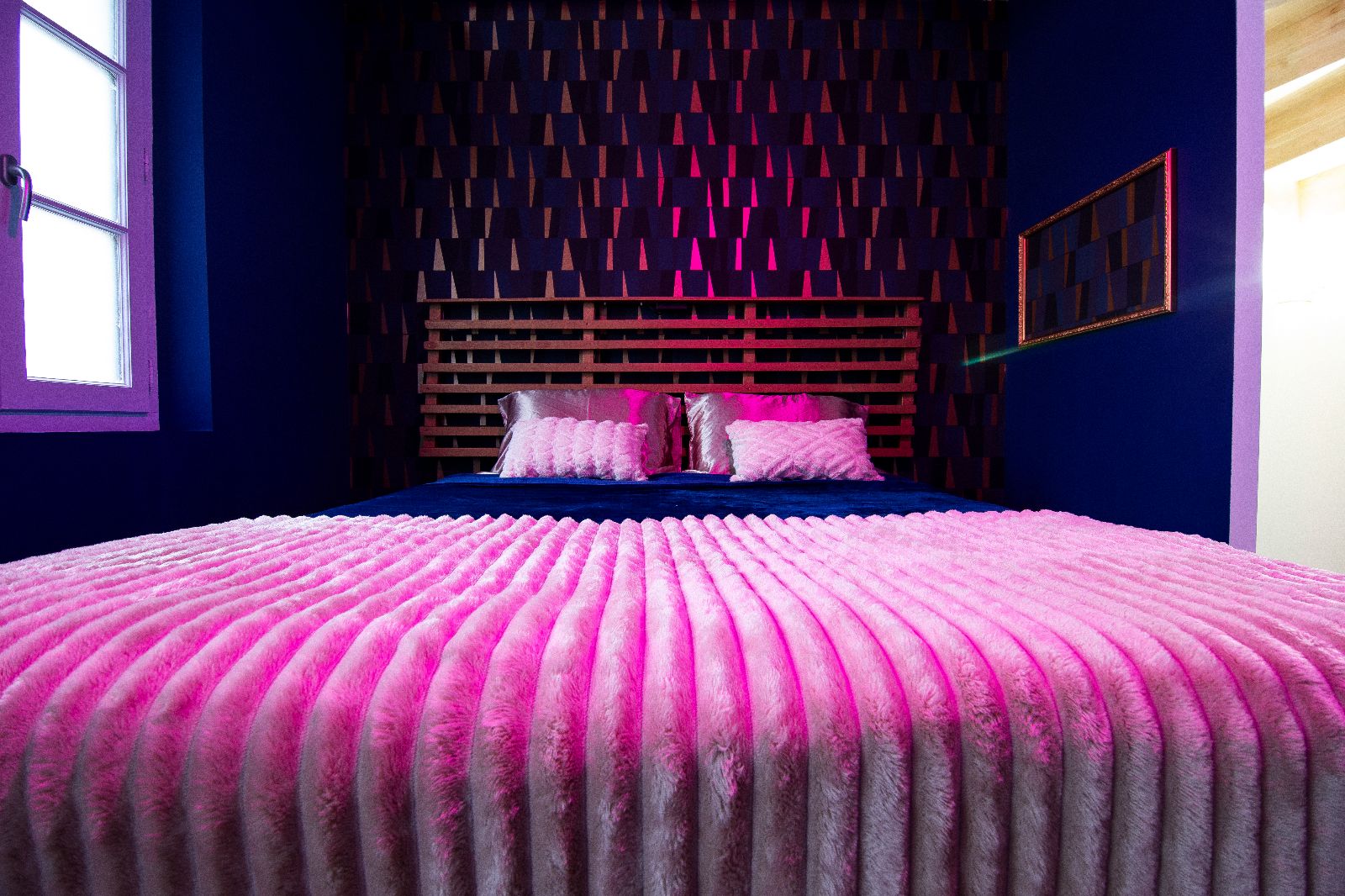 queen size bed with mirror above